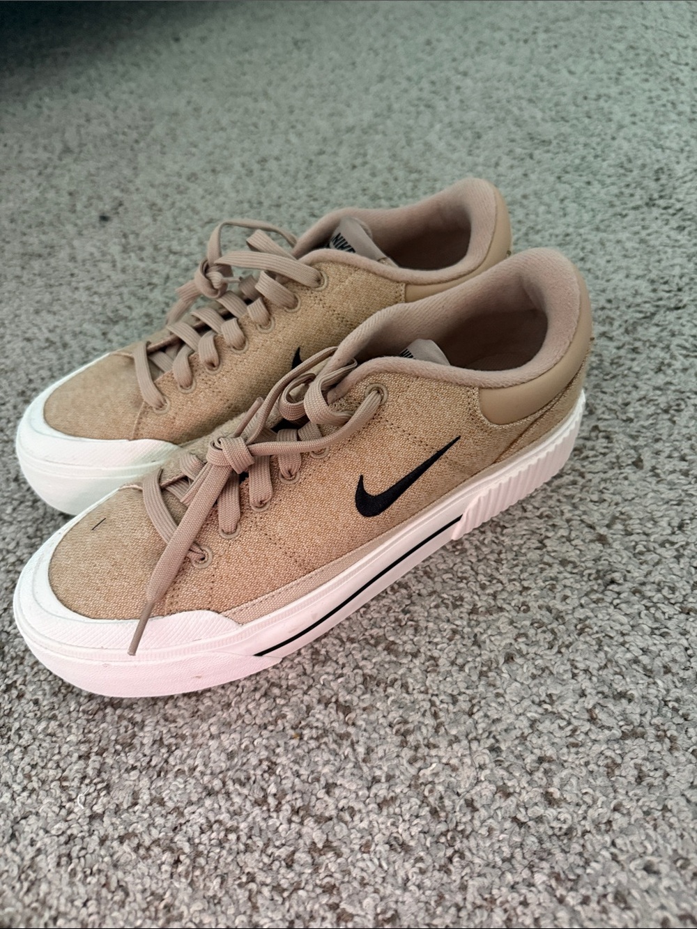 Nike Beige Canvas Low-Top Sneakers with Black Swoosh